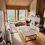 With Views Of Gaustatoppen Mountain *