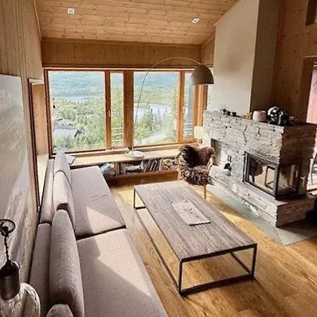 With Views Of Gaustatoppen Mountain *