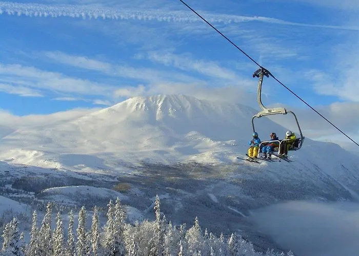 With Views Of Gaustatoppen Mountain